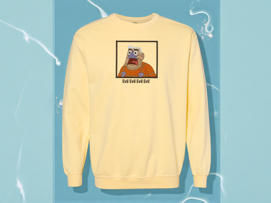 Mermaid Man Evil quote embroidered yellow sweatshirt on Comfort Colors crewneck. Funny SpongeBob nostalgia merch featuring Mermaid Man shouting.