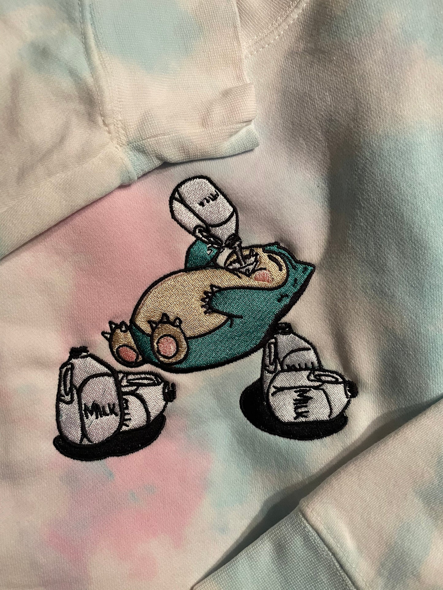 Embroidered Snorlax n' Milk Sweatshirt – Playful & Cozy Apparel