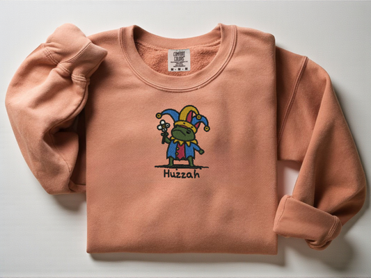 Terracotta orange Comfort Colors 1566 crewneck with whimsical medieval frog embroidery. Goblincore gift for fantasy lovers.