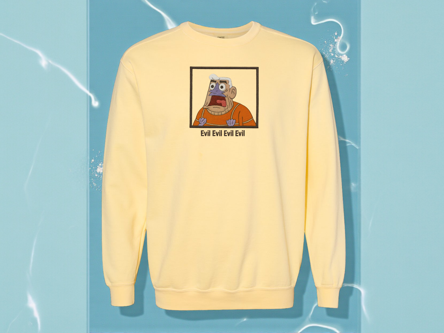 Mermaid Man Evil quote embroidered yellow sweatshirt on Comfort Colors crewneck. Funny SpongeBob nostalgia merch featuring Mermaid Man shouting.