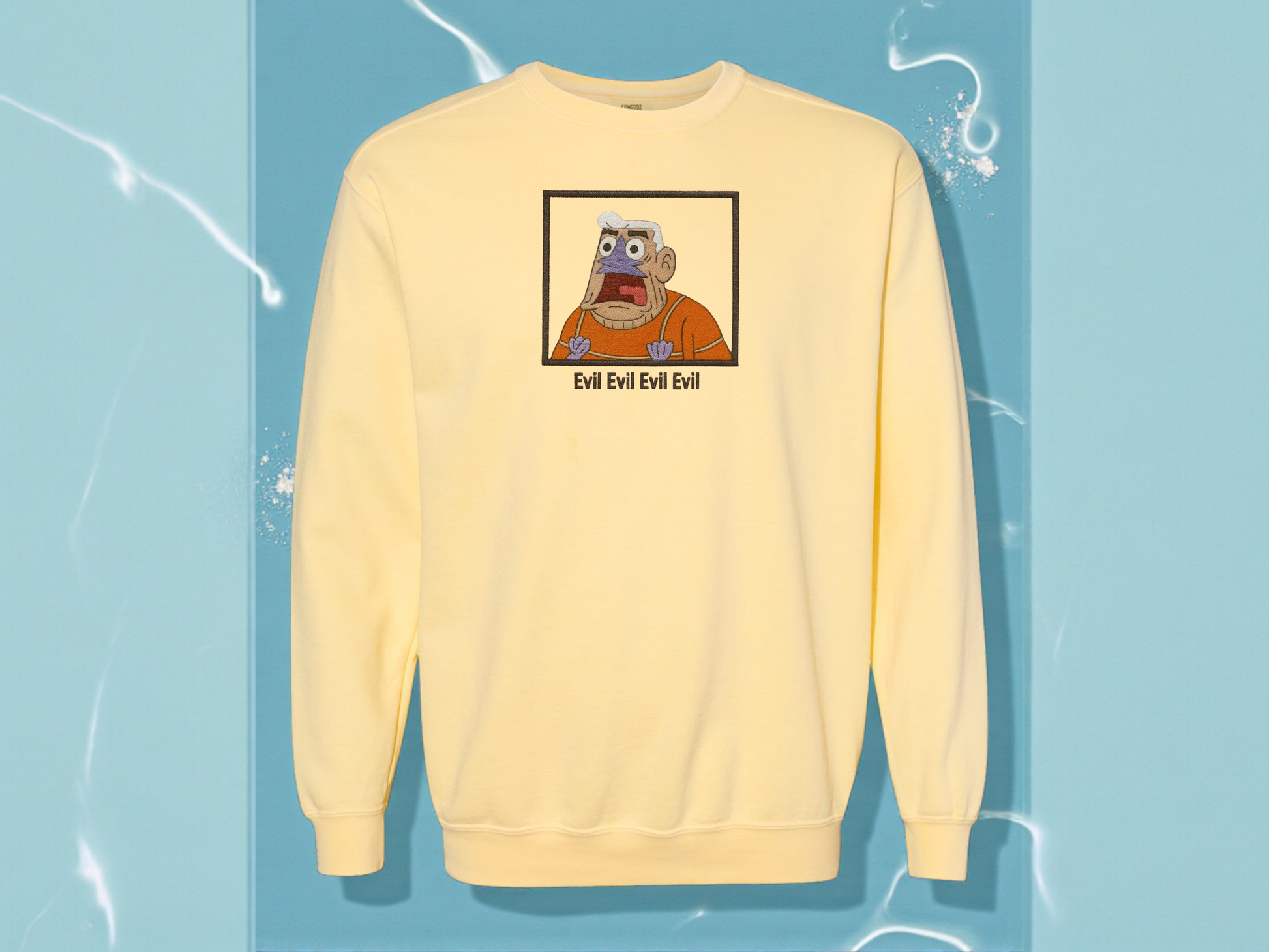 Mermaid Man Evil quote embroidered yellow sweatshirt on Comfort Colors crewneck. Funny SpongeBob nostalgia merch featuring Mermaid Man shouting.