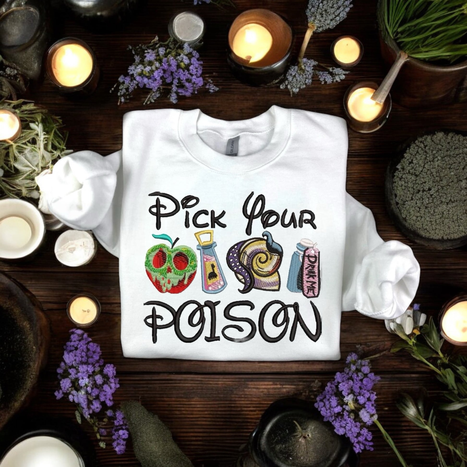 A white embroidered sweatshirt that says Pick Your Poison