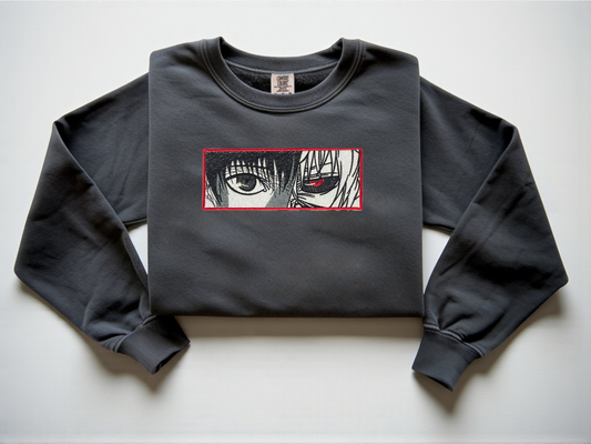 Embroidered Ken Kaneki with eyes showing on a Comfort Colors Pepper Crewneck 