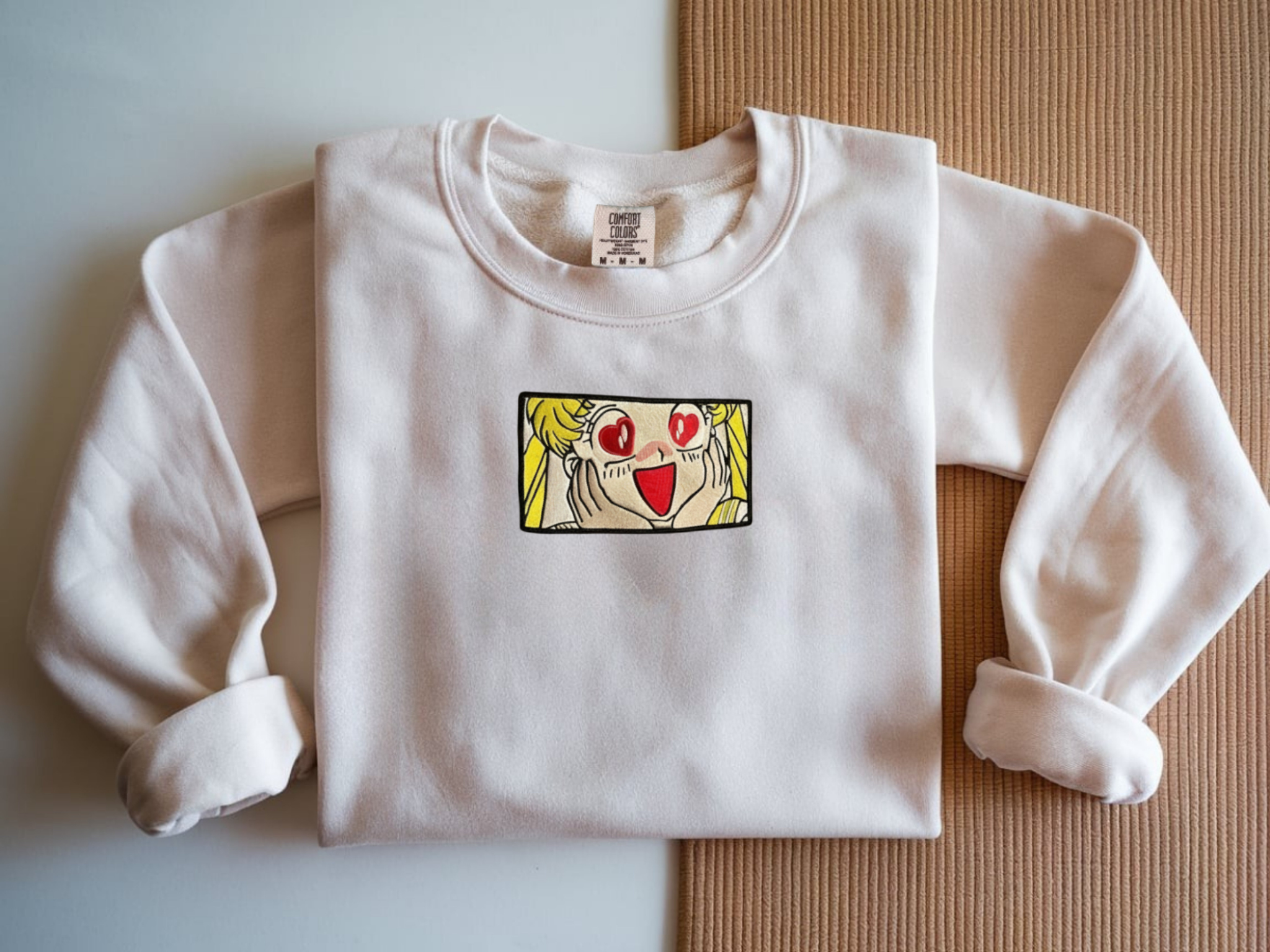 White Comfort Colors Crewneck with a Sailor Moon Venus embroidered design with heart eyes