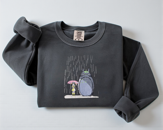 Pepper crew neck sweatshirt featuring an embroidered My Neighbor Totoro design, cute Japanese anime apparel for Ghibli fans.